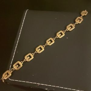 Givenshy yellow metal authentic braselet